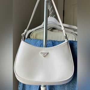 White leather Prada Cleo bag.